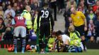 Chelsea’s John Terry receiving treatment on an ankle injury during the game against  Aston Villa at Villa Park. Photograph: Philip Brown/Reuters 