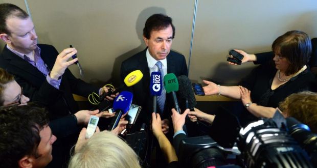 Minister for Justice Alan Shatter takes questions from the media on the Wallace controversy outside a citizenship ceremony in the Convention Centre in Dublin. Photograph: Bryan O’Brien/The Irish Times
