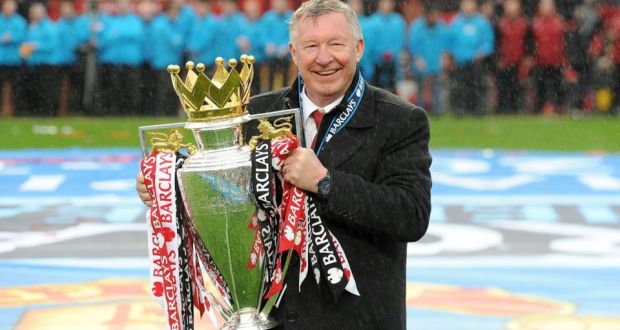  Manchester United manager Sir Alex Ferguson celebrating with the Barclays Premier League trophy.  Photograph: Martin Rickett/PA Wire.   Manchester United manager Sir Alex Ferguson celebrating with the Barclays Premier League trophy.  Photograph: Martin Rickett/PA Wire. 