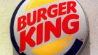  The Burger King logo hangs outside a Burger King restaurant 