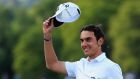 Italy’s Matteo Manassero  celebrates victory after the fourth play-off hole during the final round of the BMW PGA Championship on the West Course at Wentworth yesterday. Photograph: Getty Images