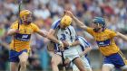 Clare’s Cian Dillon and Patrick O’Connor tackle Maurice Shanahan of Waterford at Semple Stadium. Photograph: Lorraine O’Sullivan/Inpho