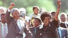 Nelson Mandela and his then wife Winnie saluting well-wishers as he leaves Victor Verster prison, February 11th, 1990. Mandela spent 27 years incarcerated as a political prisoner of South Africa’s apartheid regime. Photograph: Ulli Michel/Reuters