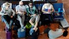 Passengers wait for their flight at Nice International airport during a strike by French air traffic controllers. The strike has ended but many passengers remain stranded. Photograph: Reuters  