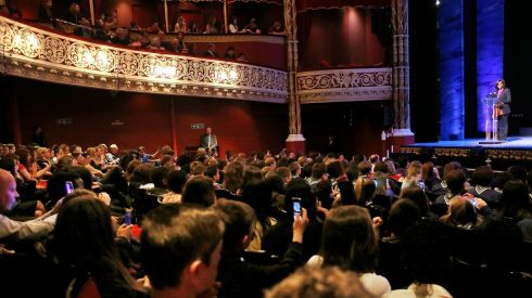 Michelle Obama addresses the crowd during the visit by herself and her daughters Malia and Sasha to the Gaiety.  Photograph: Julien Behal/PA Wire 
