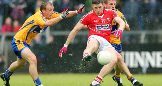 Cork’s Daniel Goulding in action against Clare’s Ger Quinlan  in the Munster football championship at Ennis last week. Munster has proved football’s most caste-ridden province. Photograph: James Crombie/Inpho 