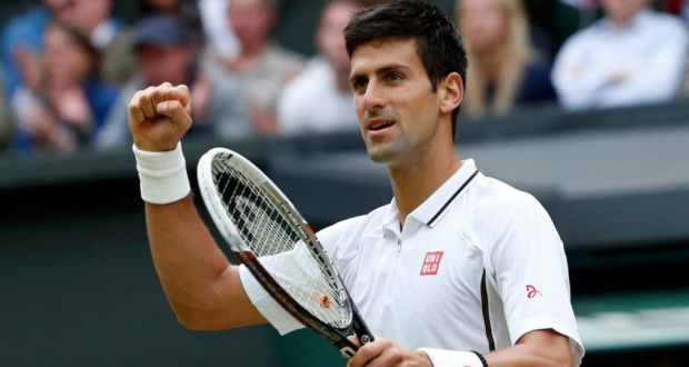 Novak Djokovic of Serbia celebrates after defeating Jeremy Chardy of France in their singles match at Wimbledon. Photograph: Eddie Keogh/Reuters