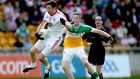 Tyrone’s Seán Cavanagh wins possession ahead of Offaly’s David Hanlon at O’Connor Park, Tullamore on Saturday. Photograph: James Crombie/Inpho