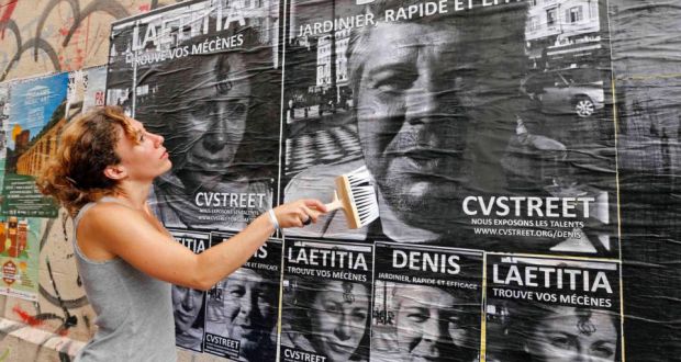 Laetitia, a 30-year-old unemployed Frenchwoman and member of CVStreet group, uses a brush to paste posters of herself and others unemployed people in the streets of Marseille. The main idea is to break the anonymity for the unemployed by posting their portraits in the street. 