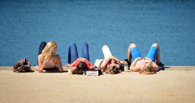  Enjoying the sun on the East Pier in Dunlaoghaire, Dublin during the good weather last month. Photograph: David Sleator/THE IRISH TIMES