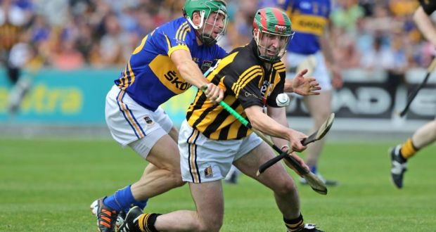 Kilkenny’s Eoin Larkin with James Woodlock of Tipperary during Saturday’s Hurling All-Ireland senior championship qualifier at  Nowlan Park. Photograph: Morgan Treacy/Inpho