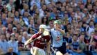Dublin’s John McCaffrey and Andrew Smith of Galway battle for possession. Photograph: Ryan Byrne/Inpho