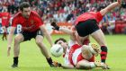 Derry’s Eoin Bradley fights for possession with Down’s Kevin McKernan and Ryan Boyle. Photograph: Inpho