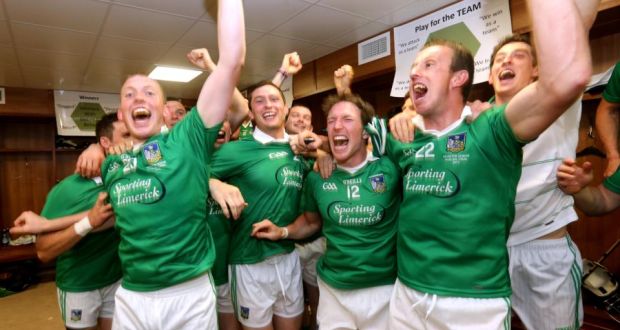 Limerick players celebrate in the dressing room after their victory over Cork. Photograph: James Crombie/Inpho