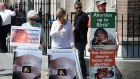 Anti-abortion protesters with graphic anti-abortion posters outside the Dáil during the debate on the Protection of Life Bill.  Photograph: Alan Betson/The Irish Times 