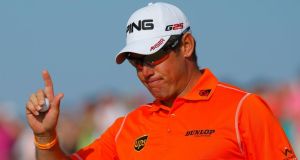 Lee Westwood after making his birdie putt on the 14th green during the third round of the British Open. Photograph: Brian Snyder/Reuters