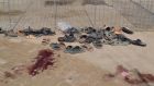 Footwear is seen near a pool of blood at the site of gun battle in Quetta. Photograph: Naseer Ahmed/Reuters