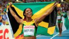 Shelly-Ann Fraser-Pryce of Jamaica celebrates winning gold in the Women’s 200 metres final in Moscow. Photograph: Jamie Squire/Getty Images