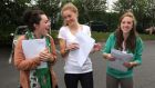 On a high: Alison Peate, Rachel Finn and Emma Cahalane celebrate their Leaving Cert results at Christ King school, Cork last week. Photograph: Darragh Kane
