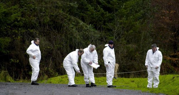 File image of Garda forensic collision investigators at work. The Bracknagh to Monasterevin road was closed this morning after the incident for crash scene investigations. Photograph: Frank Miller/The Irish Times
