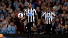 A dejected  Vurnon Anita leaves the pitch after Newcastle United 4-0 defeat at Manchester City on Monday.