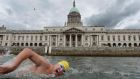 James Scallon  passing the Custom House during the Dublin City Liffey Swim .Photograph: Dara Mac Dónaill / The Irish Times