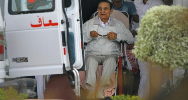 Former Egyptian president Hosni Mubarak (85) is escorted by medical and security personnel into an ambulance to be taken by helicopter ambulance from Maadi Military Hospital to the Cairo Police Academy at the weekend. Photograph: Amr Nabil/AP