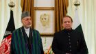 Afghan president Hamid Karzai  attends a signing ceremony with Pakistan’s prime minister Nawaz Sharif at the prime minister’s residence in Islamabad on Monday. Photograph: Mian Khursheed/Reuters