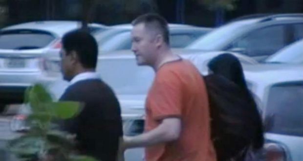 Michael Lynn being arrested in Brazil. 