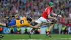 Seamus Harnedy of Cork is fouled by Clare’s Patrick Donnellan of Clare in Saturday’s final. Photograph: Donall Farmer/Inpho
