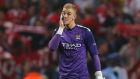 Manchester City goalkeeper Joe Hart walks off the pitch dejected after  his side’s defeat to Bayern Munich, a game in which he was at fault for two goals.  Photograph: Dave Thompson/PA Wire