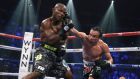 Timothy Bradley Jr. taunts  Juan Manuel Marquez  during their title fight in Las Vegas, Nevada.  Photograph: Steve Marcus/Reuters