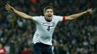 England captain Steven Gerrard celebrates his late goal during the World Cup qualifying game against Poland at Wembley. 