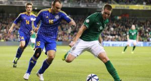 The Republic of Ireland’s Aiden McGeady (second right) crosses the ball which resulted in Kazakhstan’s Dmitriy Shomko (left) scoring an own goal during Tuesday’s World Cup qualifier at the Aviva Stadium. Photograph; Brian Lawless/PA Wire