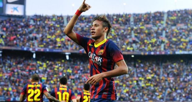 Neymar celebrates after scoring the opening goal for Barcelona during the La Liga match between against Real Madrid at Camp Nou in Barcelona. Photograph: David Ramos/Getty Images