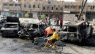 Site of a car bomb in Baghdad’s al-Shaab district yesterday. Ten car bombs exploded in the province, killing 42 people. Photograph: Reuters/Thaier al-Sudani