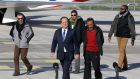 French president Francois Hollande (2ndR) walks with freed  hostages Marc Feret (L), Pierre Legrand (C), Daniel Larribe (3rd R) and Thierry Dol (R) on the tarmac upon their arrival at Villacoublay military airport, near Paris, today. Photograph: Jacky Naegelen/Reuters.