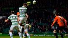Celtic’s Charlie Mulgrew scores against Dundee United with a late header. Photograph: Russell Cheyne/Reuters 