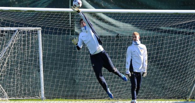 Manchester City’s Costel Pantilimon (left) trains with Joe Hart (right) at Carrington, Manchester. Photograph:  Martin Rickett/PA Wire. 