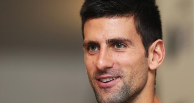 Novak Djokovic talking  to the media at the  ATP World Tour Finals at the O2 Arena. The Serb believes former world number one Roger Federer, who he faces tonight,  is noticeably slower on court. Photograph:  Clive Brunskill/Getty Images.