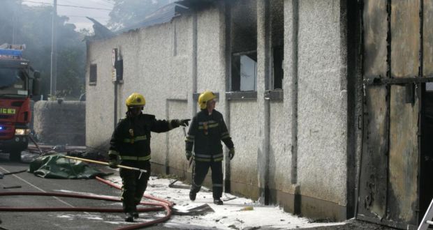 Firemen at the scene of a fatal fire on Lower Dargle Road in Bray on September 26th, 2007. The inquest into the deaths of firemen Brian Murray (46) and Mark O’Shaughnessy (26) has resumed. Photograph: Cyril Byrne/The Irish Times. 