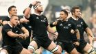 Kieran Read leads his New Zealand team-mates in the haka before their game against England. Photograph: James Crombie/Inpho