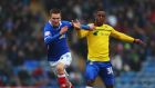 Portsmouth’s Jed Wallace is challenged by Coventry’s Frank Moussa  during the npower League One match  at Fratton Park. Photo: Bryn Lennon/Getty Images