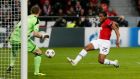  Antonio Valencia turns home Manchester United’s opening goal during the Champions League game against Bayer Leverkusen   at the BayArena. Photograph: Wolfgang Rattay/Reuters