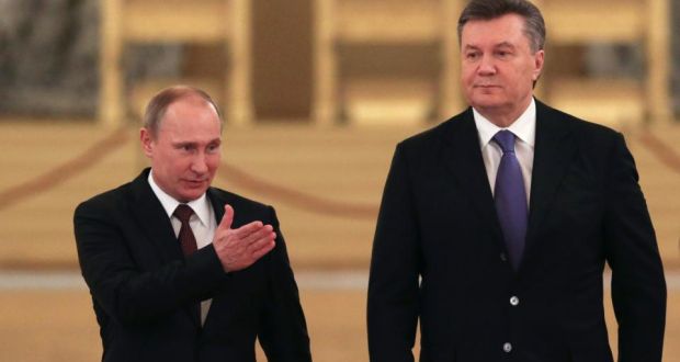 Russian president Vladimir Putin and his Ukrainian counterpart Viktor Yanukovych at the Kremlin in Moscow yesterday. Russia offered $15 billion in loans and a sharp discount on natural gas prices to Ukraine. Photograph: Sergei Karpukhin/Pool via The New York Times
