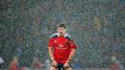 Munster’s James Downey during a hail shower at Thomond Park this evening. Photograph: Billy Stickland/Inpho