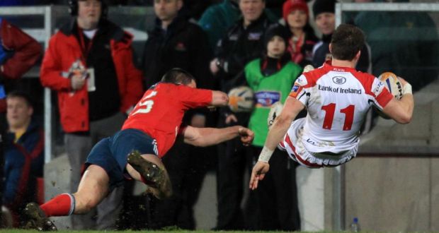 Ulster’s Craig Gilroy is tackled by Munster’s Felix Jones. Photograph: Darren Kidd/Inpho