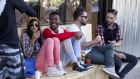 People of different races sit outside a popular coffee shop in Johannesburg. Photograph:  Melanie Stetson Freeman/Getty Images 
