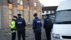 Gardaí outside the apartment block where a body was found in Finglas, Dublin. Photograph: Dara Mac Dónaill/The Irish Times