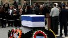 Israelis pay their respects as they walk past the flag-draped coffin of former Israeli prime minister Ariel Sharon lying in state at the Knesset, Israel’s parliament, in Jerusalem yesterday. Photograph: Reuters/Ronen Zvulun